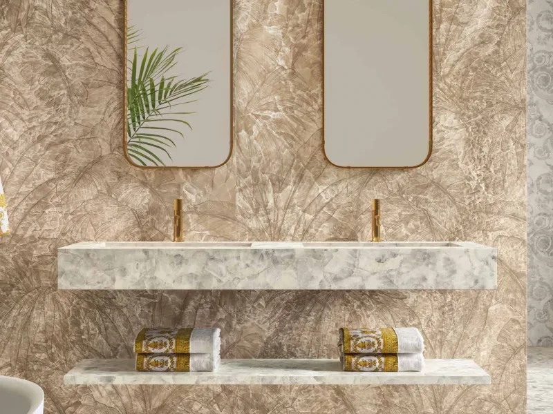 A pair of Greek mirrors 45 × 90 in gold above a double washbasin top
