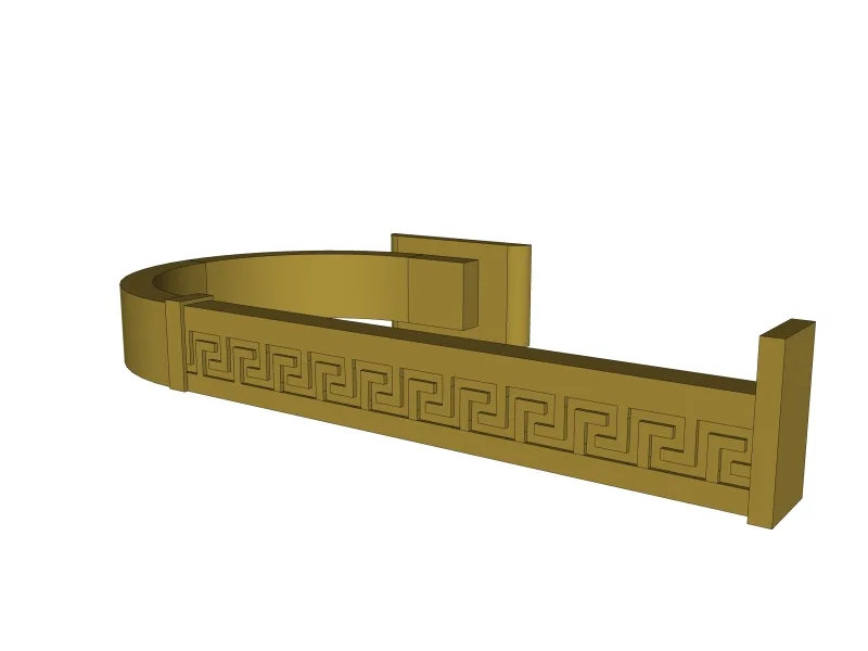 A gold Greek paper holder carrying the Greek key motif